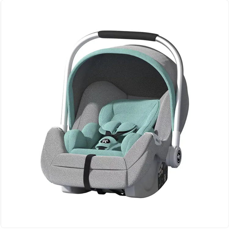Light grey and mint green infant car seat with safety harness and adjustable handle
