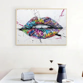 Colorful graffiti lips wall art in modern dining room with white decor.