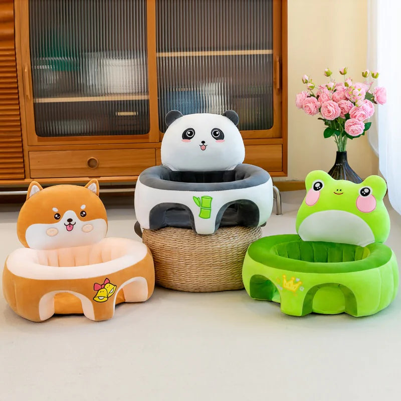 Cute animal-themed plush baby seats shaped like a dog, panda, and frog in a cozy room.