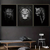 Modern living room with dark walls, showcasing leopard, lion, and lioness wall art prints.