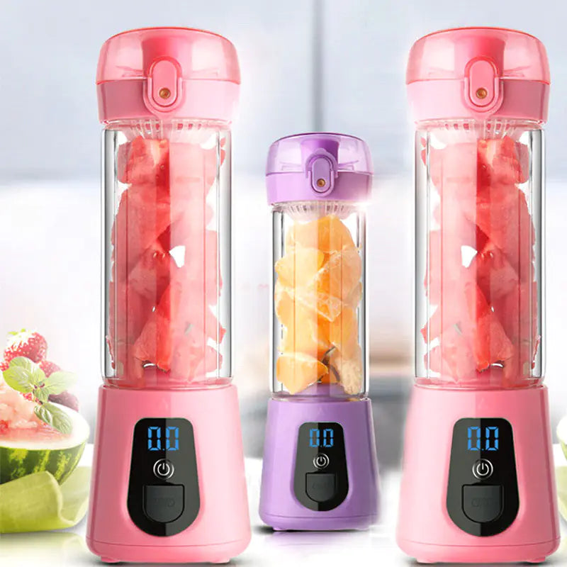 Portable blender cups with digital display, filled with fresh fruit chunks