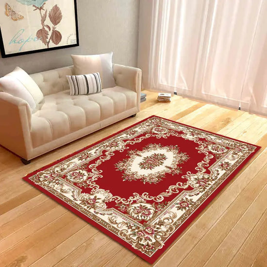 Elegant red floral area rug in modern living room with beige sofa and wood floor