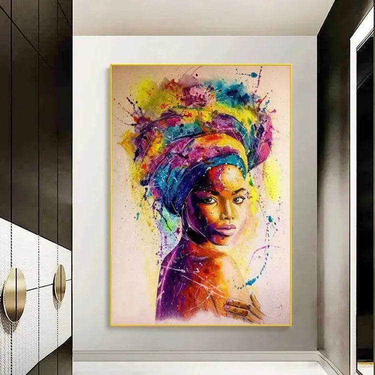 Colorful abstract painting of woman with vibrant headwrap hanging in modern hallway