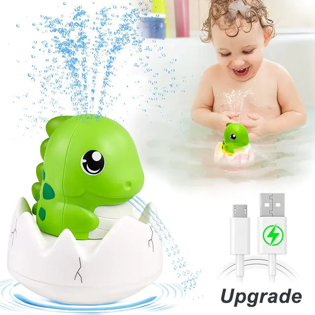Green dinosaur bath toy spraying water, baby playing in tub, USB charging cable included