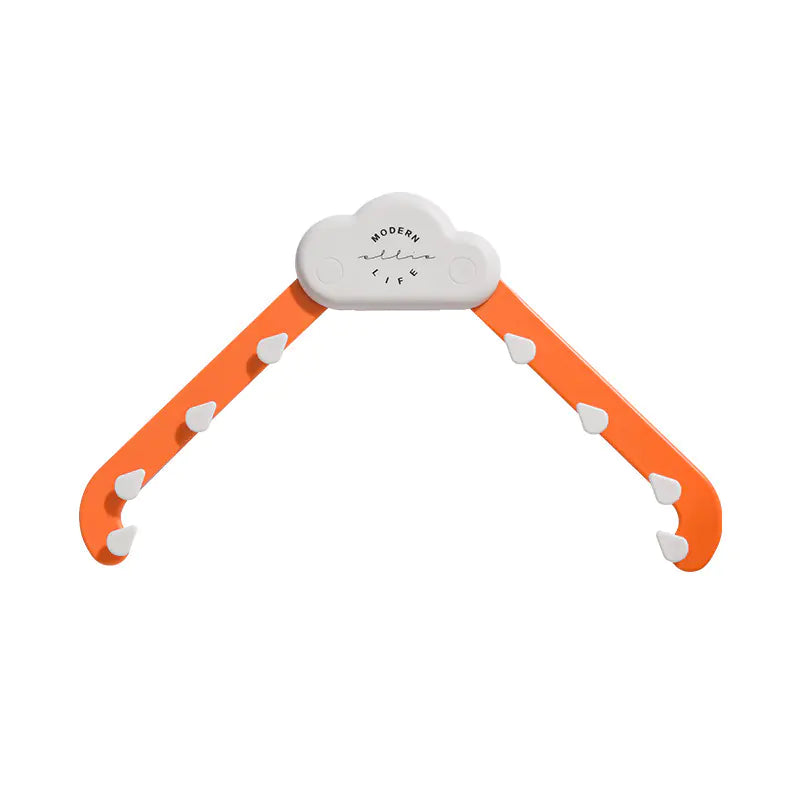 Orange and white cloud-shaped clothes hanger with hooks, modern life text
