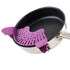 Purple silicone clip-on strainer attached to stainless steel saucepan
