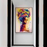 Colorful African woman portrait painting hanging in modern hallway