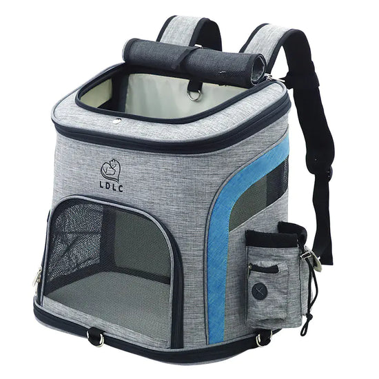 Gray pet carrier backpack with mesh windows, blue accents, and side pocket