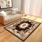 Elegant living room with beige sofa, floral painting, and ornate brown floral area rug on wood floor