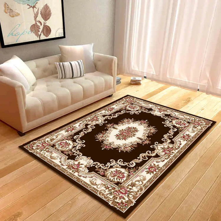Elegant living room with beige sofa, floral painting, and ornate brown floral area rug on wood floor