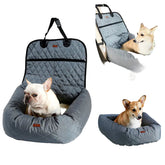 Dogs sitting in a gray quilted DogLemi car seat cover and pet bed for travel.