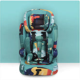 Colorful toddler car seat with abstract pattern on a turquoise background