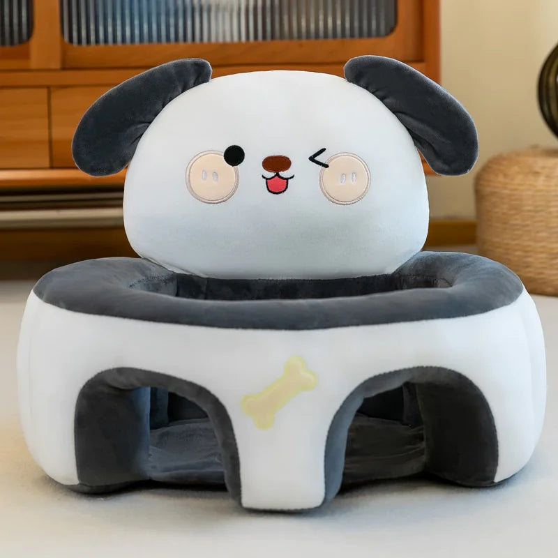 Plush dog-shaped pet bed with cartoon face and gray ears in a cozy room setting