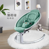 Green baby rocker chair in modern nursery with plush rug and toys